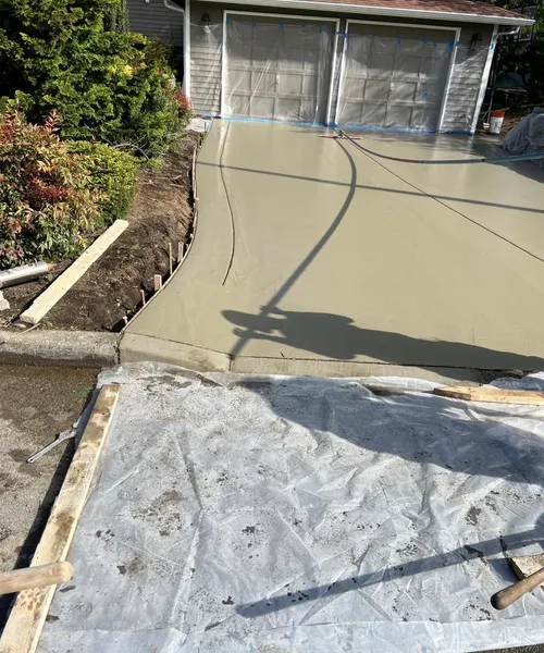 Broom Finish Driveway With Decorative Borders in Edmonds 